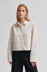 Second Female White Cap Gray Flynn Shirt