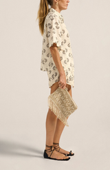 Ilio Nema Ivory + Gold Macrame Fringe Clutch