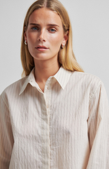 Second Female White Cap Gray Flynn Shirt
